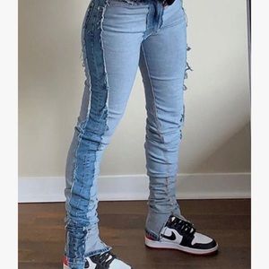 Skinny (can be stacked) light washed jeans w/ slit